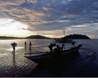 Villagers returning home as the sun sets in the Philippines (Source: UN Photo/Od