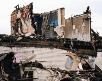 Image of home with torn roof
