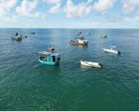 Small fishing boats on the ocean