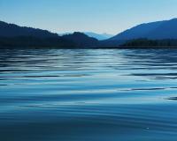 Lake with mountains in the background