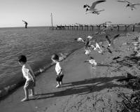 Children playing on Alabama Gulf Coast shoreline
