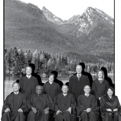 The Supreme Court Justices in front of mountain scenery